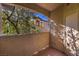 Private balcony overlooking a treetop view at 8805 Jeffreys St # 2019, Las Vegas, NV 89123