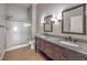 Bathroom with double vanity, granite countertop and shower at 8805 Jeffreys St # 2019, Las Vegas, NV 89123