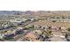 Aerial view of a residential neighborhood with mountain views at 9802 Summer Bliss Ave, Las Vegas, NV 89149