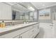 Elegant bathroom with double sinks, a soaking tub and shower at 9802 Summer Bliss Ave, Las Vegas, NV 89149