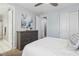 Bright bedroom with double doors to bathroom, and plenty of closet space at 9802 Summer Bliss Ave, Las Vegas, NV 89149