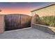 Ornate metal gate leading to the backyard at 9802 Summer Bliss Ave, Las Vegas, NV 89149