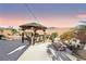 Peaceful patio featuring a gazebo and fire pit at 9802 Summer Bliss Ave, Las Vegas, NV 89149