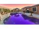 Spacious pool with a waterfall feature and built-in spa at 9802 Summer Bliss Ave, Las Vegas, NV 89149