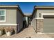 Elegant entryway with stone accents and double door at 9820 Maiden Pink Ave, Las Vegas, NV 89149