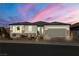 Beautiful single-story home with landscaping and a two-car garage at 9820 Maiden Pink Ave, Las Vegas, NV 89149