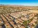 Wide aerial view highlighting the home's location at 10852 Avenzano St, Las Vegas, NV 89141