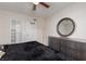 Bedroom with a dresser and large mirror at 1889 Avacado Ct, Henderson, NV 89014