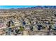 Aerial view of a residential area with desert landscape and mountain backdrop at 2039 Colvin Run Dr, Henderson, NV 89052