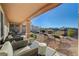 Relaxing backyard patio with seating and desert landscaping at 2039 Colvin Run Dr, Henderson, NV 89052