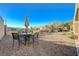 Backyard patio with table and chairs, perfect for outdoor dining at 2039 Colvin Run Dr, Henderson, NV 89052