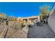 Spacious backyard with patio furniture and desert landscaping at 2039 Colvin Run Dr, Henderson, NV 89052