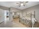 Bright bedroom featuring a mirrored closet and a metal-frame bed at 2039 Colvin Run Dr, Henderson, NV 89052