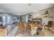 Spacious dining room with a large table, fireplace and hardwood floors at 2039 Colvin Run Dr, Henderson, NV 89052