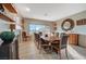 Elegant dining room with a wood table and hardwood floors at 2039 Colvin Run Dr, Henderson, NV 89052