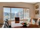 Dining room with a view, large table and hardwood floors at 2039 Colvin Run Dr, Henderson, NV 89052