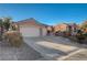 Two-car garage and front yard landscaping at 2039 Colvin Run Dr, Henderson, NV 89052