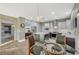 Updated kitchen with stainless steel appliances and an island at 2039 Colvin Run Dr, Henderson, NV 89052