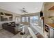 Living room with a fireplace, sliding doors, and hardwood floors at 2039 Colvin Run Dr, Henderson, NV 89052
