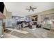 Open concept living room with kitchen view and hardwood floors at 2039 Colvin Run Dr, Henderson, NV 89052