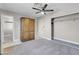 Spacious bedroom with ceiling fan and large closet at 213 Valley Forge Ave, Henderson, NV 89015