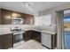 Updated kitchen, granite countertops, and stainless steel appliances at 213 Valley Forge Ave, Henderson, NV 89015