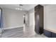 Bright living room featuring gray vinyl plank flooring at 213 Valley Forge Ave, Henderson, NV 89015