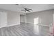 Spacious living room with hardwood floors and a fireplace at 213 Valley Forge Ave, Henderson, NV 89015