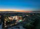 Luxury home with pool and city views at sunset at 22 Anthem Pointe Ct, Henderson, NV 89052