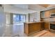 Modern kitchen with granite countertops and stainless steel appliances at 222 Karen Ave # 1604, Las Vegas, NV 89109
