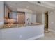Modern kitchen with granite countertops and stainless steel appliances at 222 Karen Ave # 1604, Las Vegas, NV 89109