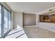 Open living room with balcony access and city views at 222 Karen Ave # 1604, Las Vegas, NV 89109