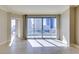 Living room with access to balcony and city views at 222 Karen Ave # 1604, Las Vegas, NV 89109