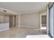 Bright living room with tile floors and access to a balcony at 222 Karen Ave # 1604, Las Vegas, NV 89109