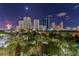 Night view of city skyline with palm trees at 222 Karen Ave # 1604, Las Vegas, NV 89109