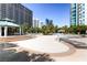 Relaxing pool deck with lounge chairs and sand area at 222 Karen Ave # 1604, Las Vegas, NV 89109