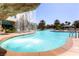 Inviting pool with a waterfall and lounge chairs at 222 Karen Ave # 1604, Las Vegas, NV 89109