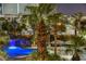 Enjoy the resort-style pool at night at 222 Karen Ave # 1604, Las Vegas, NV 89109