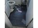 Bathroom with damaged tiles and a dirty toilet reflecting neglect and the need for extensive cleaning and repair at 2612 Cabot St, Las Vegas, NV 89102