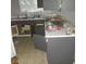 Dirty kitchen counter with cabinets and drawers at 2612 Cabot St, Las Vegas, NV 89102