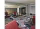 Spacious living room featuring damaged furniture at 2612 Cabot St, Las Vegas, NV 89102