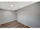 Empty bedroom with gray walls and wood-look floors at 3152 S Eastern Ave # 26, Las Vegas, NV 89169