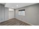 Simple bedroom with hardwood floors and closet at 3152 S Eastern Ave # 26, Las Vegas, NV 89169