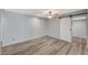 Bedroom with barn door and hardwood floors at 3152 S Eastern Ave # 26, Las Vegas, NV 89169