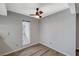 Bright bedroom with hardwood floors and large window at 3152 S Eastern Ave # 26, Las Vegas, NV 89169