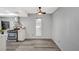 Bright dining area with wood-look floors and large window at 3152 S Eastern Ave # 26, Las Vegas, NV 89169