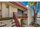 Condo building exterior with wooden stairs and railings at 3152 S Eastern Ave # 26, Las Vegas, NV 89169