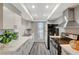 Modern kitchen with stainless steel appliances and white cabinets at 3152 S Eastern Ave # 26, Las Vegas, NV 89169