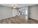 Living room with wood-look floors and barn door at 3152 S Eastern Ave # 26, Las Vegas, NV 89169