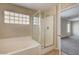 Bathroom featuring bathtub and separate glass door shower at 3349 Morning Amber St, North Las Vegas, NV 89032